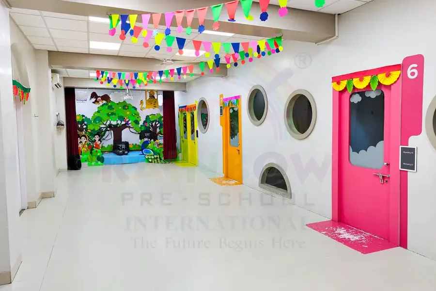 Bright preschool hallway with colourful classroom doors and child-friendly displays