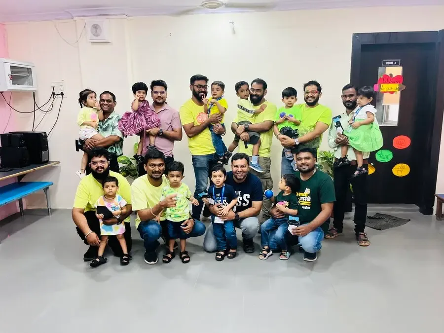 Children and adults gathered for a preschool Father's Day activity