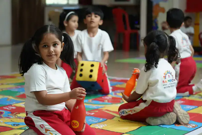 Group learning activity in a Sr. KG class